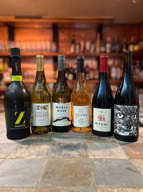 Row of 6 different wines