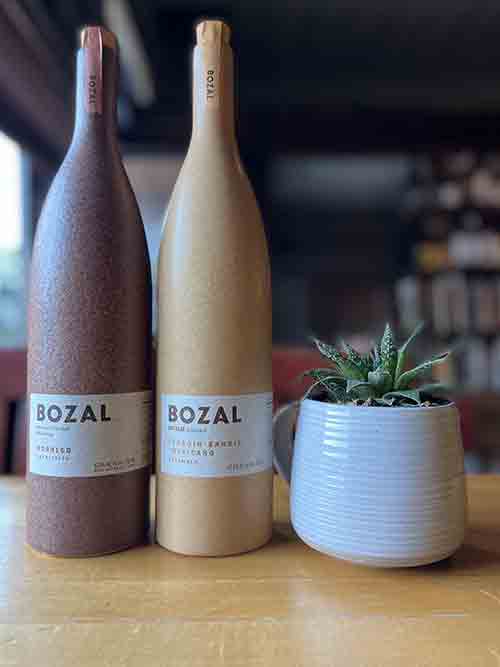 Two bottles of Bozal Mescal